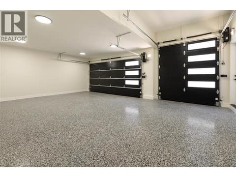 Triple garage with over sized 3rd Bay door at 979 Loseth Drive, Black Mountain, Kelowna