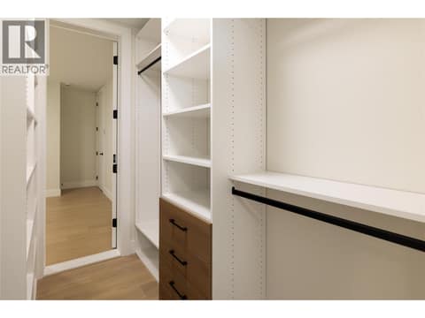 Walk in Closet with access to legal suite at 979 Loseth Drive, Black Mountain, Kelowna