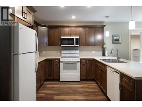 Functional kitchen lots of cupboards at 2100 55 Avenue Unit# 56, Harwood, Vernon