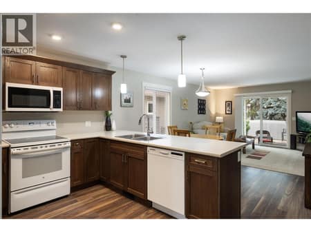 Functional kitchen lots of cupboards at 2100 55 Avenue Unit# 56, Harwood, Vernon