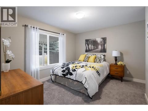 Main bedroom, view to back yard at 2100 55 Avenue Unit# 56, Harwood, Vernon