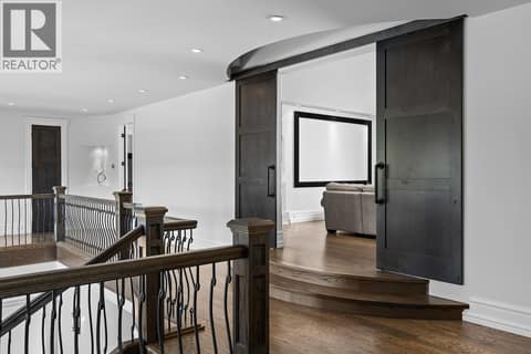 A tiered entry to your cinematic threshold at 4165 Gellatly Road, Westbank Centre, West Kelowna