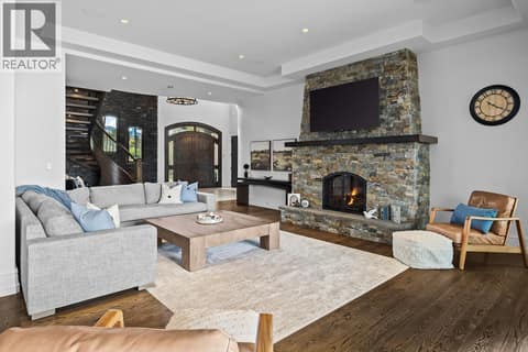 Cozy Stone Fireplace at 4165 Gellatly Road, Westbank Centre, West Kelowna