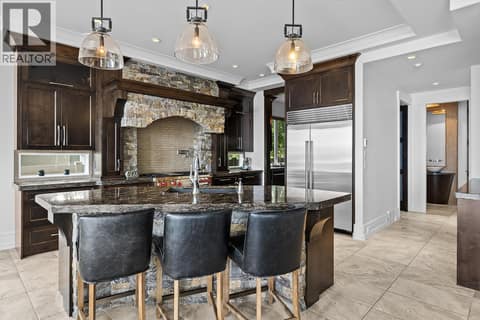 Granite and Stone Adorned Kitchen at 4165 Gellatly Road, Westbank Centre, West Kelowna
