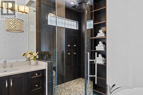 Primary Wing's Walk in shower with rain head at 4165 Gellatly Road, Westbank Centre, West Kelowna