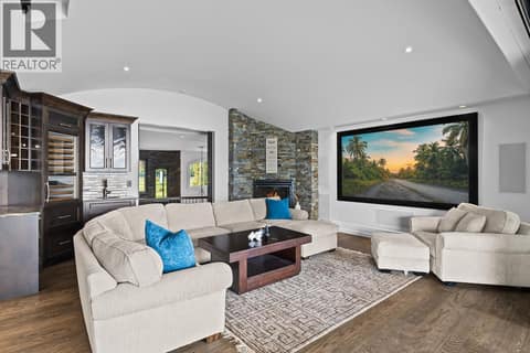 Theatre room with wet bar at 4165 Gellatly Road, Westbank Centre, West Kelowna
