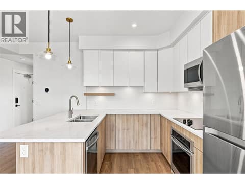 Kitchen with Stainless Steel Appliances/Large island at 1280 Sutherland Avenue Unit# 602, Springfield/Spall, Kelowna