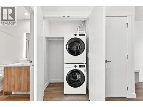 Laundry stacked and storage at 1280 Sutherland Avenue Unit# 602, Springfield/Spall, Kelowna