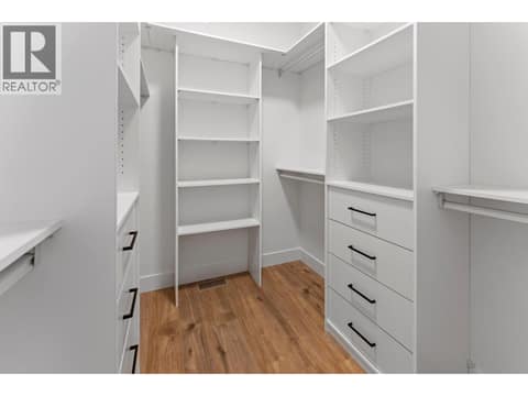 Primary walk-in closet at 2871 Copper Ridge Drive, Smith Creek, West Kelowna