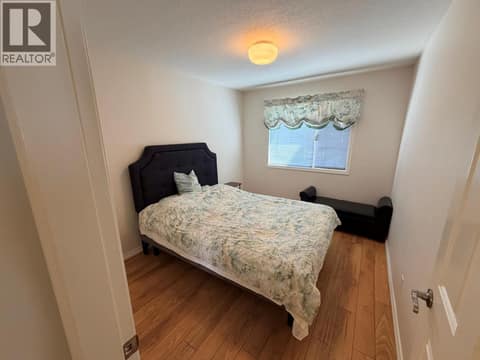 Guest bedroom main floor at 3930 20 Street Unit# 12, Harwood, Vernon