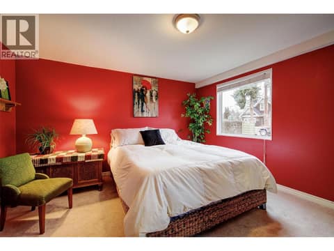 1 of 2 bedrooms on the lower level at 391 Braeloch Road, Upper Mission, Kelowna