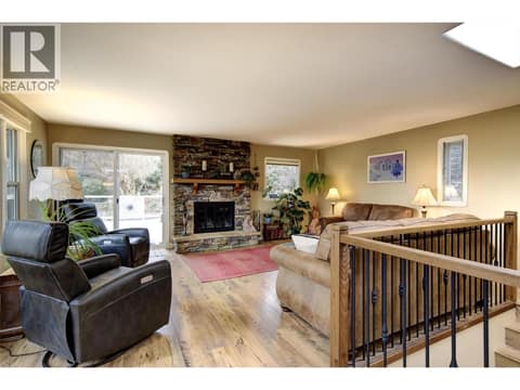 Access from the living room to the patio at 391 Braeloch Road, Upper Mission, Kelowna