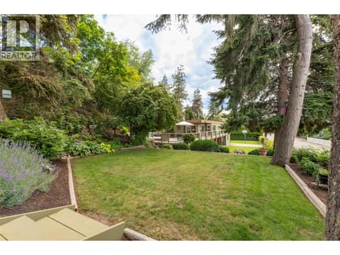 Access to the wrap around deck from both lawns at 391 Braeloch Road, Upper Mission, Kelowna
