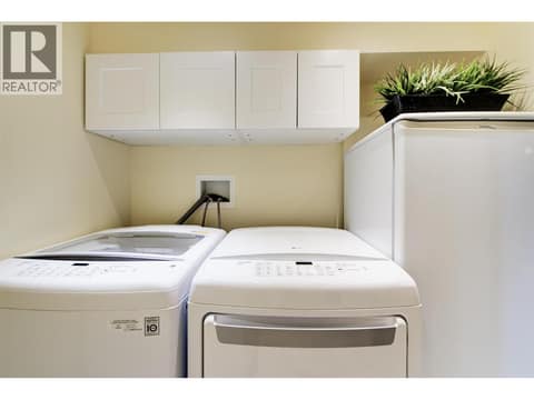 Built in cabinets over washer and dryer at 391 Braeloch Road, Upper Mission, Kelowna