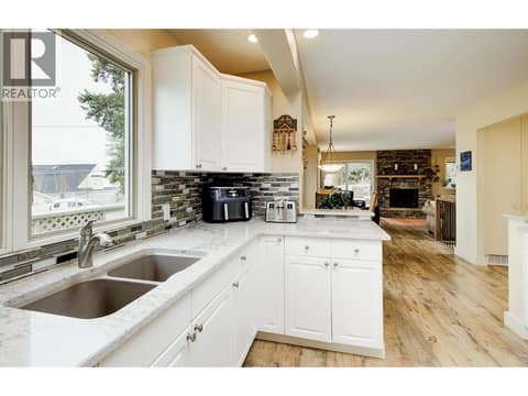 Kitchen renovation done in 2016 - new cabinets, quartz counters and expansion 3 ft at 391 Braeloch Road, Upper Mission, Kelowna