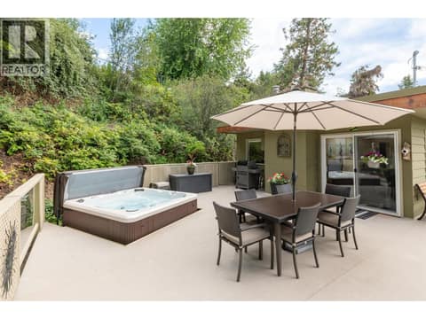 Wet zone 2012 hot tub on large 1100 sqft patio at 391 Braeloch Road, Upper Mission, Kelowna