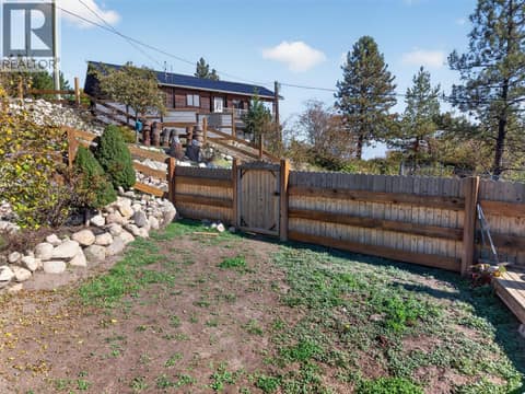 Fence to lower yard at 10375 Westshore Road, Okanagan North, Vernon