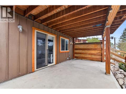 Leading out to the lower patio at 10375 Westshore Road, Okanagan North, Vernon