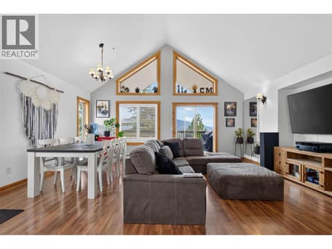 Vaulted ceilings with big windows to capture light at 10375 Westshore Road, Okanagan North, Vernon