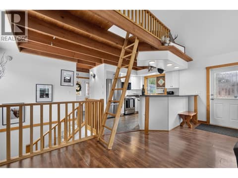 With the loft accessed by the step ladder at 10375 Westshore Road, Okanagan North, Vernon