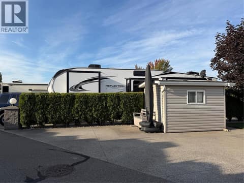 Room to park a small car by the shed at 8000 Highland Road Lot# 146, North BX, Vernon