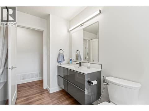 Main Bathroom with Laundry at 1907 19 Street, East Hill, Vernon