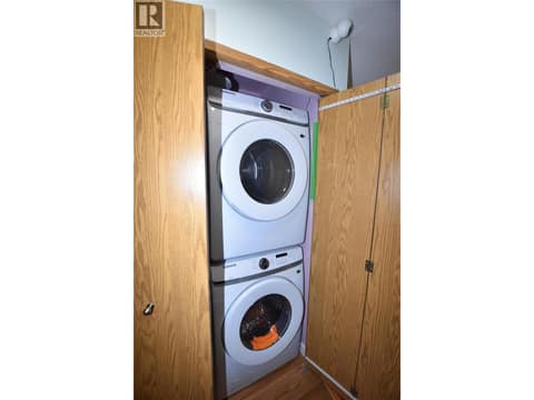 Laundry area there is room to put them side by side if one does not want them stacked at 3608 27 Avenue Unit# 301, City of Vernon