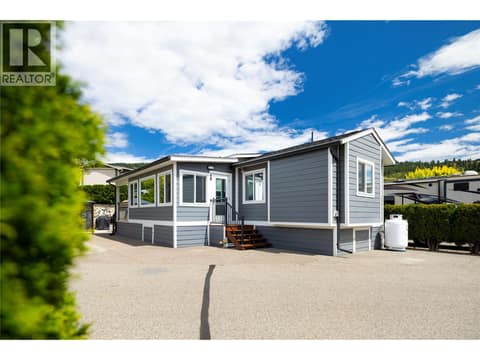 Front corner of your home, large corner lot with privacy hedges at 8000 Highland Road Unit# 48, North BX, Vernon