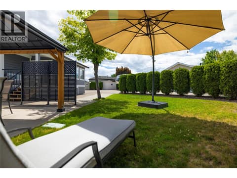 Grass keeps the yard cool at 8000 Highland Road Unit# 48, North BX, Vernon