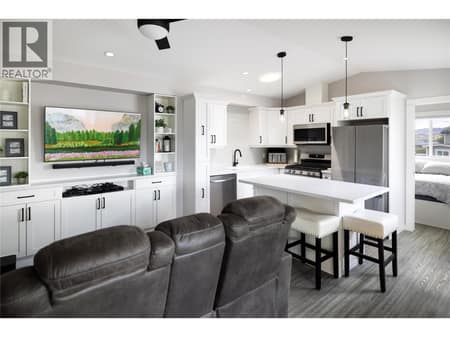 Open concept living room and kitchen at 8000 Highland Road Unit# 48, North BX, Vernon