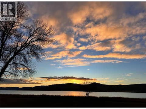 Winter sunset view across Swan Lake at 8000 Highland Road Unit# 48, North BX, Vernon