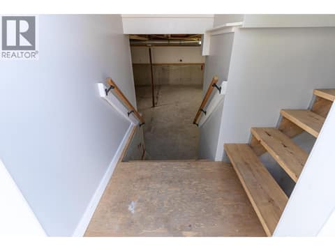 Access way and separate entry to the unfinished basement at 2323 Vale Avenue, Lumby Valley