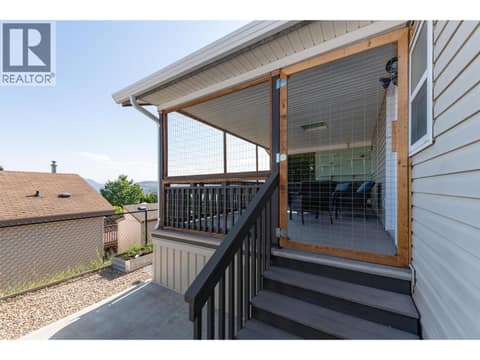 Deck Access at Back at 2440 Old Okanagan Highway Unit# 1304, Westbank Centre, West Kelowna