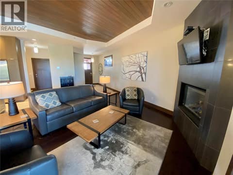 Front door leading to open living area. at 101 Dormie Drive Unit# 3E, Predator Ridge, Vernon