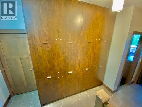 Owner lockers downstairs. at 101 Dormie Drive Unit# 3E, Predator Ridge, Vernon
