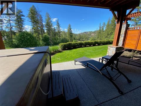 Private hot tub outside the bedrooms. at 101 Dormie Drive Unit# 3E, Predator Ridge, Vernon