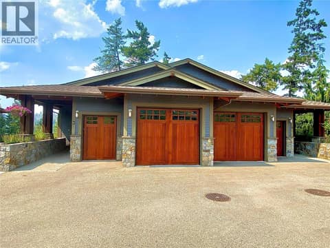 Single car garage and golf cart garage. at 101 Dormie Drive Unit# 3E, Predator Ridge, Vernon