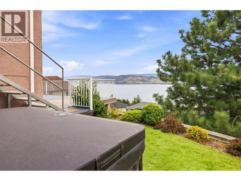 Backyard Space | Lower Level - With low-maintenance turf, hot tub & views! at 1525 Bear Creek Road Unit# 14, West Kelowna Estates
