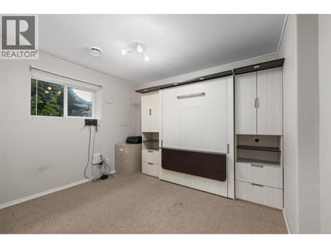 Bedroom #4 | Lower Level - with built-in Murphy Bed at 1525 Bear Creek Road Unit# 14, West Kelowna Estates