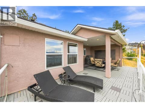 Deck #1 | Main Level - Partially covered deck with full lake views! at 1525 Bear Creek Road Unit# 14, West Kelowna Estates