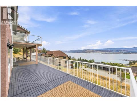 Deck #2 | Lower Level - Partially covered deck with outdoor access to upper level at 1525 Bear Creek Road Unit# 14, West Kelowna Estates