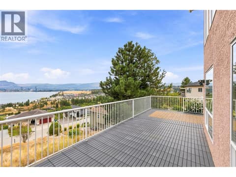 Deck #2 | Lower Level - Partially covered deck with outdoor access to upper level at 1525 Bear Creek Road Unit# 14, West Kelowna Estates