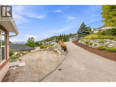 Private driveway with additional parking space at 1525 Bear Creek Road Unit# 14, West Kelowna Estates