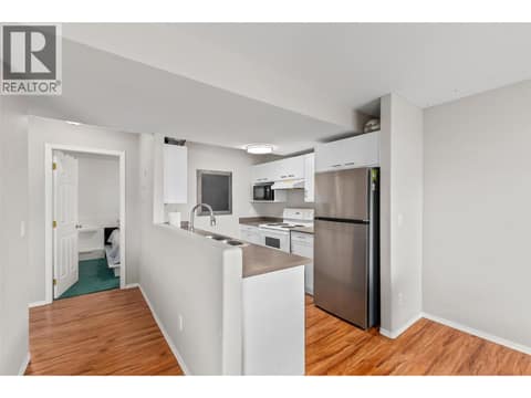 Suite Kitchen | Lower Level - With updated stainless steel appliances at 1525 Bear Creek Road Unit# 14, West Kelowna Estates
