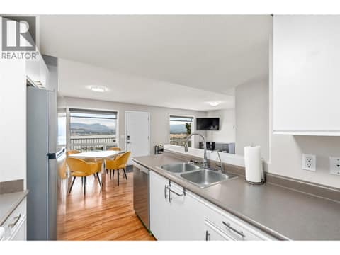 Suite Kitchen | Lower Level - With updated stainless steel appliances at 1525 Bear Creek Road Unit# 14, West Kelowna Estates