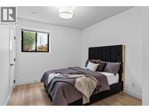 5th bedroom on lower floor at 1539 Rocky Point Drive, Wilden, Kelowna