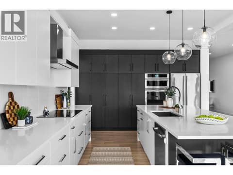 Large wall of pantry cupboards with pull-outs at 1539 Rocky Point Drive, Wilden, Kelowna