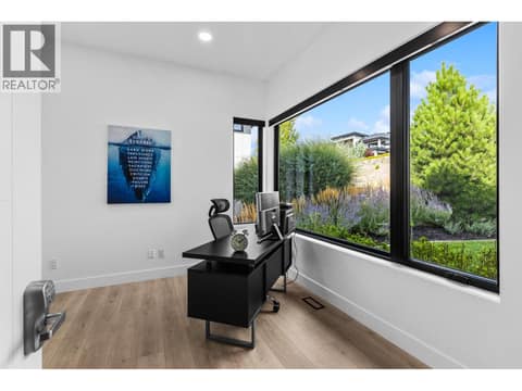 Main floor den/office, but also a bedroom at 1539 Rocky Point Drive, Wilden, Kelowna