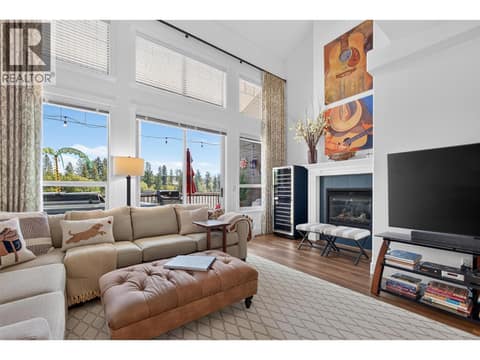 Cozy gas fireplace feature at 3359 Cougar Road Unit# 9, Westbank Centre, West Kelowna