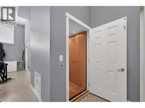 Elevator access from the 1st level at 3359 Cougar Road Unit# 9, Westbank Centre, West Kelowna